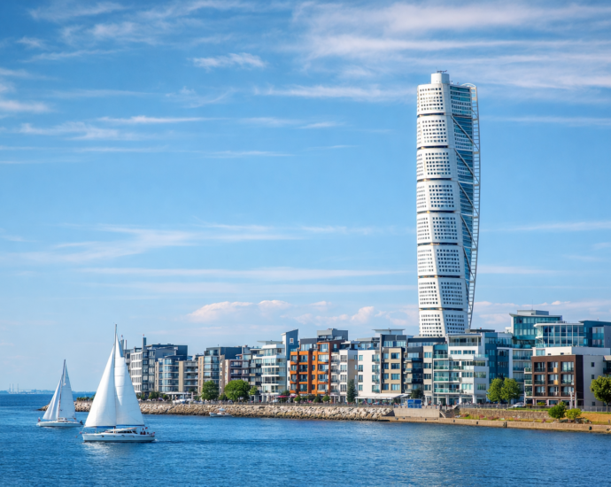 malmö waterfront with turning torso and sailboats
